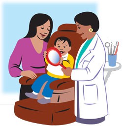 dentist checking a child's teeth