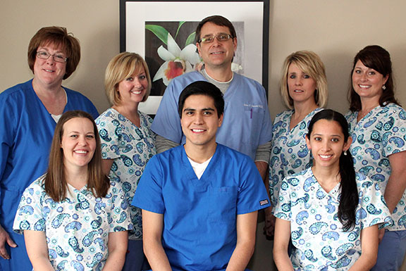 John James DDS with staff at Klondike Dental Care